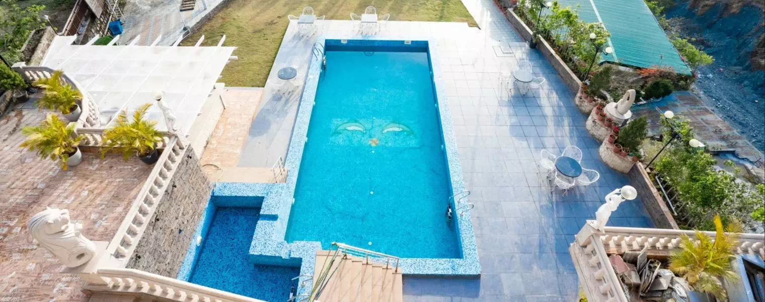 best resort in dehradun with swimming pool